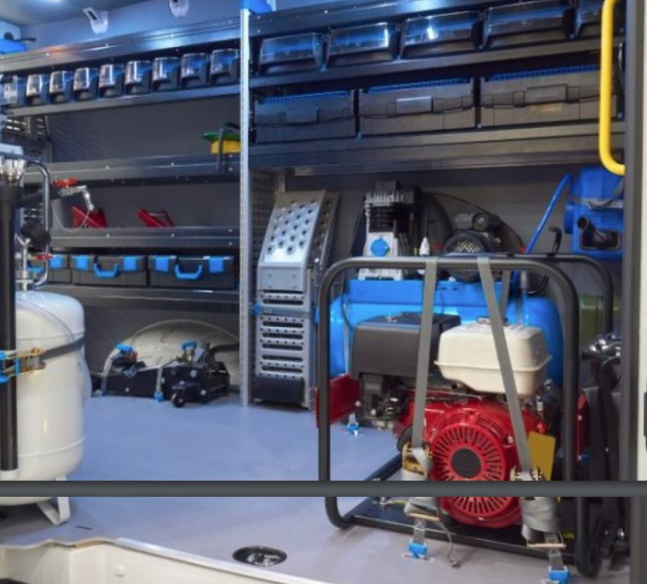 interior of a service truck with various cleanng equipment