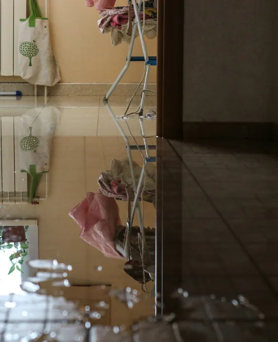 A modern kitchen with significant flooding